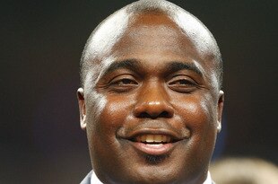 ST. LOUIS - DECEMBER 20:  Former running back Marshall Faulk of the St. Louis Rams addresses the fans during a halftime ceremony to retire his jersey on December 20, 2007 at Edward Jones Dome in St. Louis, Missouri.  (Photo by Elsa/Getty Images)