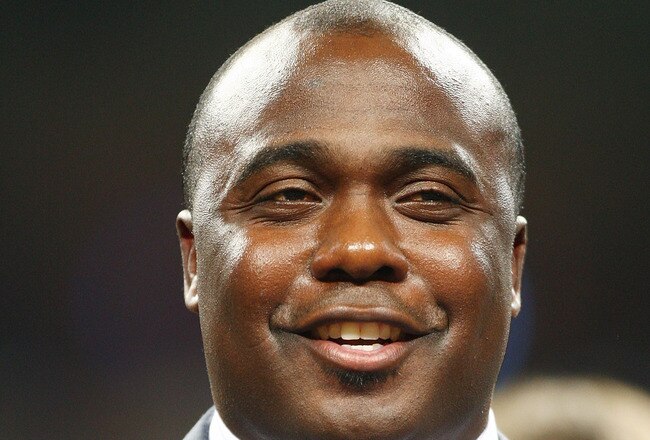 ST. LOUIS - DECEMBER 20:  Former running back Marshall Faulk of the St. Louis Rams addresses the fans during a halftime ceremony to retire his jersey on December 20, 2007 at Edward Jones Dome in St. Louis, Missouri.  (Photo by Elsa/Getty Images)