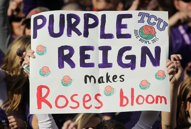 PASADENA, CA - JANUARY 01:  A fan of the TCU Horned Frogs holds a sign during the 97th Rose Bowl game against the Wisconsin Badgers on January 1, 2011 in Pasadena, California.  (Photo by Jeff Gross/Getty Images)