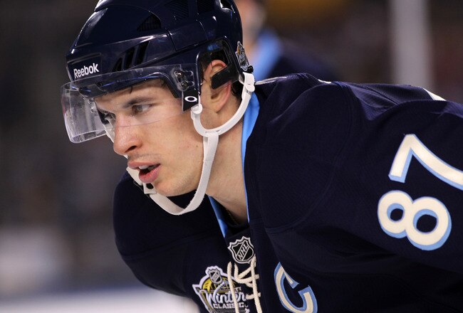 PITTSBURGH, PA - JANUARY 01:  Sidney Crosby #87 of the Pittsburgh Penguins looks on while playing against the Washington Capitals during the 2011 NHL Bridgestone Winter Classic at Heinz Field on January 1, 2011 in Pittsburgh, Pennsylvania.  (Photo by Jamie Squire/Getty Images)