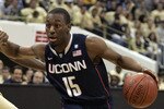 PITTSBURGH, PA - DECEMBER 27:  Kemba Walker #15 of the Connecticut Huskies drives to the basket against Ashton Gibbs #12 of the Pittsburgh Panthers at Petersen Events Center on December 27, 2010 in Pittsburgh, Pennsylvania.  (Photo by Justin K. Aller/Getty Images)
