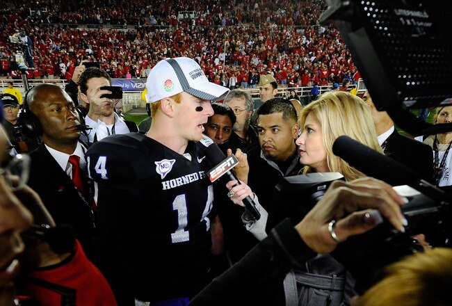 PASADENA, CA - JANUARY 01:  Quarterback Andy Dalton #14 of the TCU Horned Frogs is interviewed by reporter Erin Andrews after defeating the Wisconsin Badgers 21-19 in the 97th Rose Bowl game on January 1, 2011 in Pasadena, California.  (Photo by Kevork Djansezian/Getty Images)