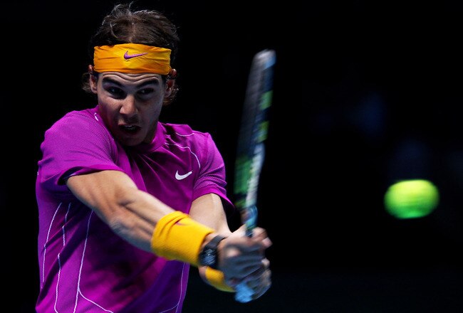 LONDON, ENGLAND - NOVEMBER 28:  Rafael Nadal of Spain plays a forehand during his men's final match against Roger Federer of Switzerland during the ATP World Tour Finals at O2 Arena on November 28, 2010 in London, England.  (Photo by Clive Brunskill/Getty Images)