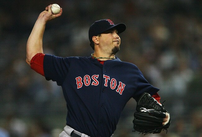 NEW YORK - SEPTEMBER 24:  Josh Beckett #19 of the Boston Red Sox pitches against the New York Yankees on September 24, 2010 at Yankee Stadium in the Bronx borough of New York City.  (Photo by Andrew Burton/Getty Images)