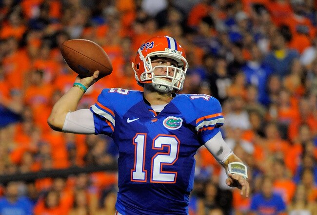 GAINESVILLE, FL - SEPTEMBER 25:  Quarterback John Brantley #12 of the Florida Gators throws a pass against the Kentucky Wildcats at Ben Hill Griffin Stadium on September 25, 2010 in Gainesville, Florida.  (Photo by Doug Benc/Getty Images)