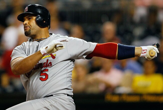 PITTSBURGH - SEPTEMBER 21:  Albert Pujols #5 of the St. Louis Cardinals hits an RBI single against the Pittsburgh Pirates during the game on September 21, 2010 at PNC Park in Pittsburgh, Pennsylvania.  (Photo by Jared Wickerham/Getty Images)