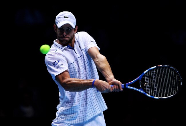 LONDON, ENGLAND - NOVEMBER 26:  Andy Roddick of the USA returns the ball during his men's singles match against Novak Djokovic of Serbia during the ATP World Tour Finals at O2 Arena on November 26, 2010 in London, England.  (Photo by Julian Finney/Getty Images)