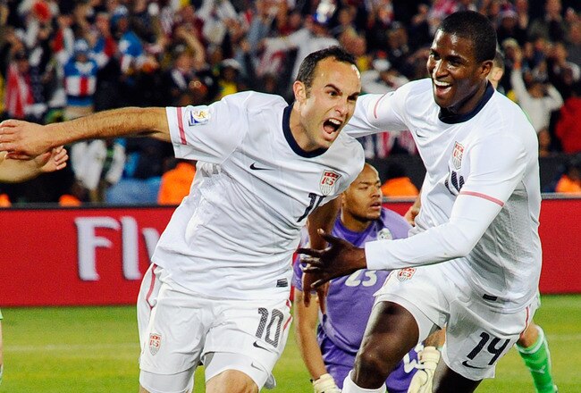 PRETORIA, SOUTH AFRICA - JUNE 23:  Landon Donovan of the United States celebrates with teammate Edson Buddle after scoring the winning goal that sends the USA through to the second round during the 2010 FIFA World Cup South Africa Group C match between USA and Algeria at the Loftus Versfeld Stadium on June 23, 2010 in Tshwane/Pretoria, South Africa. (Photo by Kevork Djansezian/Getty Images)