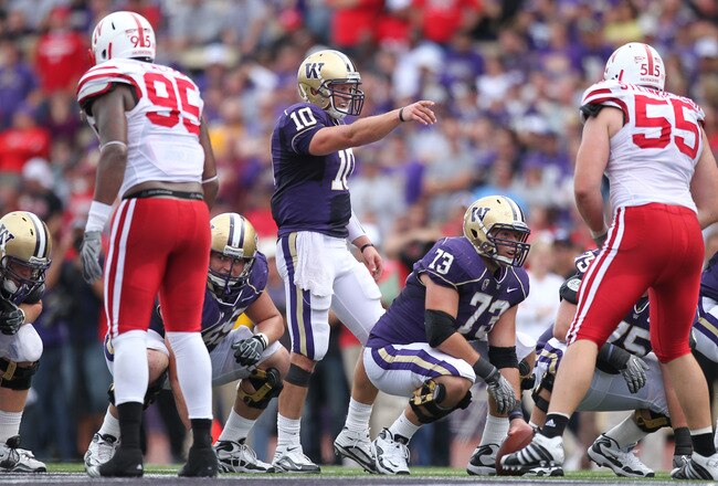 SEATTLE - SEPTEMBER 18: Quarterback Jake Locker #10 of the Washington Huskies points at the line of scrimmage against the Nebraska Cornhuskers on September 18, 2010 at Husky Stadium in Seattle, Washington. (Photo by Otto Greule Jr/Getty Images)