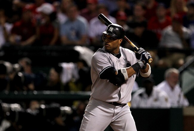 ARLINGTON, TX - OCTOBER 22:  Robinson Cano #24 of the New York Yankees bats against the Texas Rangers in Game Six of the ALCS during the 2010 MLB Playoffs at Rangers Ballpark in Arlington on October 22, 2010 in Arlington, Texas. The Rangers won 6-1.  (Photo by Stephen Dunn/Getty Images)