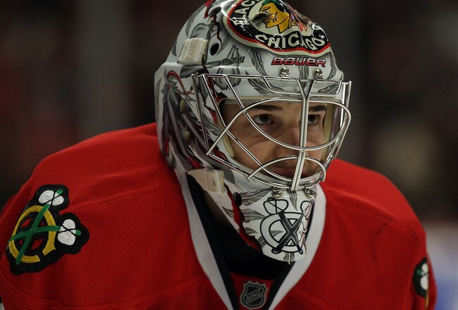 CHICAGO, IL - DECEMBER 15: Corey Crawford #50 of the Chicago Blackhawks takes a break during a time-out of a game against the Colorado Avalanche at the United Center on December 15, 2010 in Chicago, Illinois. The Avalanche defeated the Blackhawks 4-3. (Photo by Jonathan Daniel/Getty Images)