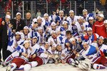 BUFFALO, NY - JANUARY 05: Members of Team Russia pose with the IIHF World Junior Trophy after defeating Canada 5-3 during the 2011 IIHF World U20 Championship Gold medal game between Canada and Russia on January 5, 2011 in Buffalo, New York.  (Photo by Rick Stewart/Getty Images)