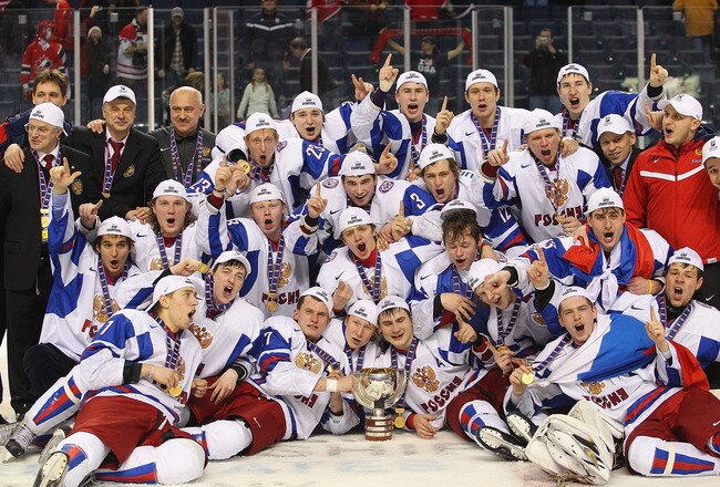 BUFFALO, NY - JANUARY 05: Members of Team Russia pose with the IIHF World Junior Trophy after defeating Canada 5-3 during the 2011 IIHF World U20 Championship Gold medal game between Canada and Russia on January 5, 2011 in Buffalo, New York.  (Photo by Rick Stewart/Getty Images)