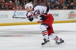 ANAHEIM, CA - NOVEMBER 19:  Mike Commodore #22 of the Columbus Blue Jackets shoots the puck against the Anaheim Ducks at the Honda Center on November 19, 2010 in Anaheim, California.  (Photo by Jeff Gross/Getty Images)