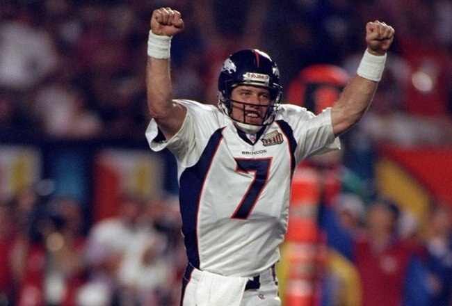 31 Jan 1999: Quarterback John Elway #7 of the Denver Broncos celebrates the first touchdown during the first quarter of Super Bowl XXXIII against the Atlanta Falcons at Pro Player Stadium in Miami, Florida. The Broncos defeated the Falcons 34-19 to win their scond consecutive Super Bowl.