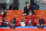 BUFFALO, NY - JANUARY 05: Dave Cameron, head coach  of Team Canada stands with some of his players after losing to Russia during the 2011 IIHF World U20 Championship Gold medal game between Canada and Russia at the HSBC Arena on January 5, 2011 in Buffalo, New York. Russia scored 5 unanswered goals in the third period to win. (Photo by Rick Stewart/Getty Images)