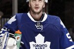 TORONTO, CANADA - JANUARY 6: Jonas Gustavsson #50 of the Toronto Maple Leafs reacts to the 5th goal scored by the St. Louis Blues during game action at the Air Canada Centre January 6, 2011 in Toronto, Ontario, Canada. (Photo by Abelimages/Getty Images)