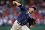 ARLINGTON, TX - OCTOBER 09:  Pitcher Matt Garza #22 of the Tampa Bay Rays throws against the Texas Rangers during game 3 of the ALDS at Rangers Ballpark in Arlington on October 9, 2010 in Arlington, Texas.  (Photo by Ronald Martinez/Getty Images)