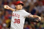 ARLINGTON, TX - OCTOBER 01:  Pitcher Jered Weaver #36 of the Los Angeles Angels of Anaheim throws against the Texas Rangers at Rangers Ballpark in Arlington on October 1, 2010 in Arlington, Texas.  (Photo by Ronald Martinez/Getty Images)