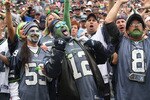 SEATTLE - SEPTEMBER 26:  Fans of the Seattle Seahawks cheer during the game against the San Diego Chargers at Qwest Field on September 26, 2010 in Seattle, Washington. The Seahawks defeated the Chargers 27-20. (Photo by Otto Greule Jr/Getty Images)