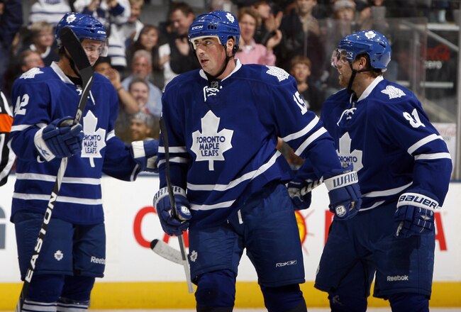 TORONTO - OCTOBER 2: Tyler Bozak #42, Tomas Kaberle #15 and Phil Kessel #81 of the Toronto Maple Leafs celebrate Kaberle's goal against the Detroit Red Wings during a preseason NHL game at the Air Canada Centre October 2, 2010 in Toronto, Ontario, Canada. (Photo by Abelimages/Getty Images)