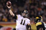 TEMPE, AZ - DECEMBER 28:  Quarterback Blaine Gabbert #11 of the Missouri Tigers throws a pass during the Insight Bowl against the Iowa Hawkeyes at Sun Devil Stadium on December 28, 2010 in Tempe, Arizona.  The Hawkeyes defeated the Tigers 27-24. (Photo by Christian Petersen/Getty Images)