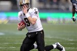 SEATTLE, WA - JANUARY 08:  Quarterback Drew Brees #9 of the New Orleans Saints fixes his helmet after he was sacked in the second quarter against the Seattle Seahawks during the 2011 NFC wild-card playoff game at Qwest Field on January 8, 2011 in Seattle, Washington.  (Photo by Otto Greule Jr/Getty Images)