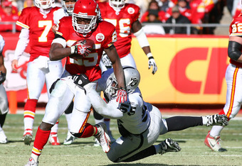 KANSAS CITY, MO - JANUARY 02:  Running back Jamaal Charles #25 of the Kansas City Chiefs is tackled by linebacker Rolando McClain #55 of the Oakland Raiders in a game at Arrowhead Stadium on January 2, 2011 in Kansas City, Missouri.  (Photo by Tim Umphrey/Getty Images)