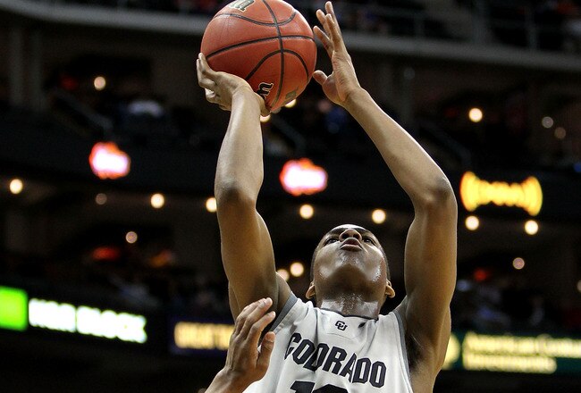 KANSAS CITY, MO - MARCH 10:  Alec Burks #10 of the Colorado Buffaloes shoots the ball over John Roberson #21 of  the Texas Tech Red Raiders in the first half during the first round game of the 2010 Phillips 66 Big 12 Men's Basketball Tournament at the Sprint Center on March 10, 2010 in Kansas City, Missouri.  (Photo by Jamie Squire/Getty Images)