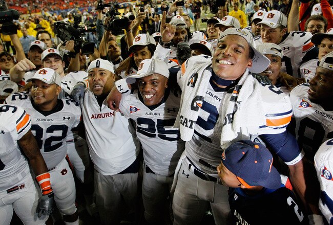 ATLANTA, GA - DECEMBER 04:  Quarterback Cam Newton #2 of the Auburn Tigers celebrates after their 56-17 win over the South Carolina Gamecocks during the 2010 SEC Championship at Georgia Dome on December 4, 2010 in Atlanta, Georgia.  (Photo by Kevin C. Cox/Getty Images)