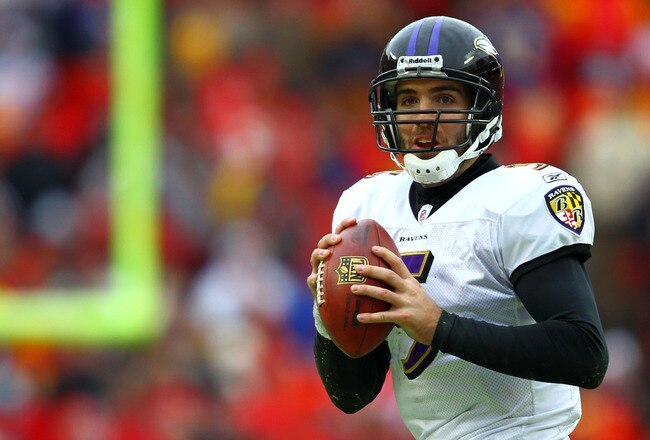 KANSAS CITY, MO - JANUARY 09:  Quarterback Joe Flacco #5 of the Baltimore Ravens looks to pass against the Kansas City Chiefs in their 2011 AFC wild card playoff game at Arrowhead Stadium on January 9, 2011 in Kansas City, Missouri.  (Photo by Dilip Vishwanat/Getty Images)