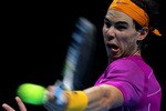 LONDON, ENGLAND - NOVEMBER 28:  Rafael Nadal of Spain plays a forehand during his men's final match against Roger Federer of Switzerland during the ATP World Tour Finals at O2 Arena on November 28, 2010 in London, England.  (Photo by Matthew Lewis/Getty Images)