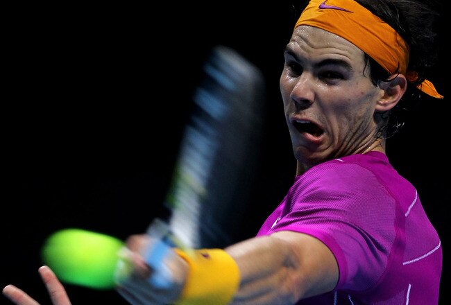 LONDON, ENGLAND - NOVEMBER 28:  Rafael Nadal of Spain plays a forehand during his men's final match against Roger Federer of Switzerland during the ATP World Tour Finals at O2 Arena on November 28, 2010 in London, England.  (Photo by Matthew Lewis/Getty Images)