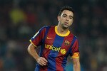 BARCELONA, SPAIN - DECEMBER 21:  Xavi Hernandez of Barcelona looks on during the round of last 16 Copa del Rey match between FC Barcelona and Athletic Bilbao at the Camp Nou stadium on December 21, 2010 in Barcelona, Spain.  (Photo by Jasper Juinen/Getty Images)