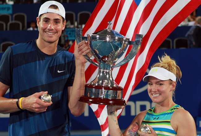 PERTH, AUSTRALIA - JANUARY 08:  John Isner and Bethanie Mattek-Sands of the USA hold the Hopman Cup trophy after defeating Justine Henin and Ruben Bemelmans of Belgium in the final on day eight of the Hopman Cup on January 8, 2011 in Perth, Australia.  (Photo by Paul Kane/Getty Images)