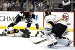 PITTSBURGH, PA - JANUARY 10:  Jordan Staal #11 of the Pittsburgh Penguins attempts to pass the puck around Patrice Bergeron #37 of the Boston Bruins on January 10, 2011 at Consol Energy Center in Pittsburgh, Pennsylvania.  (Photo by Justin K. Aller/Getty Images)