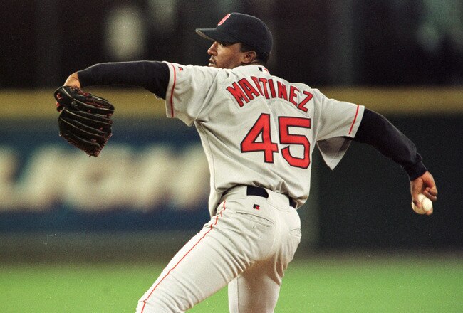 4 Apr 2000:  Starting pitcher Pedro Martinez of the Boston Red Sox delivers a pitch in the first inning of the home opener for the Seattle Mariners at Safeco Field in Seattle, Washington. Mandatory Credit: Otto Greule/ALLSPORT
