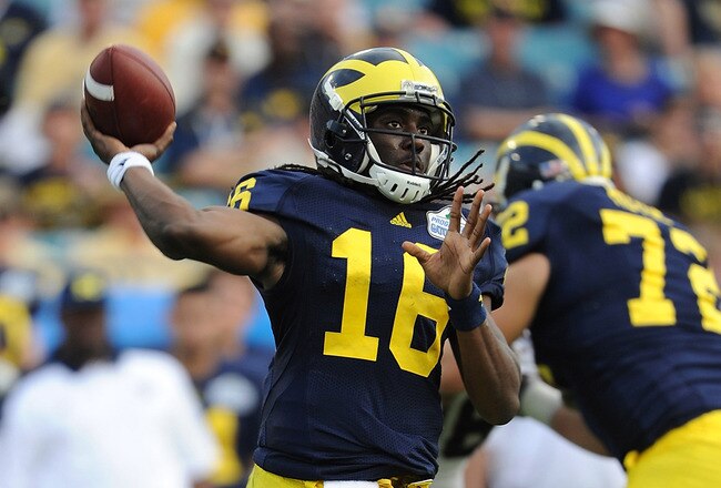 JACKSONVILLE, FL - JANUARY 01:  Quarterback Denard Robinson #16 of the Michigan Wolverines passes against the Mississippi State Bulldogs during the Gator Bowl at EverBank Field on January 1, 2011 in Jacksonville, Florida  (Photo by Rick Dole/Getty Images)