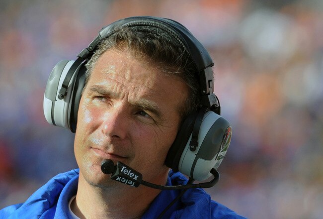 TAMPA, FL - JANUARY 1:  Coach Urban Meyer of the Florida Gators directs play against the Penn State Nittany Lions January 1, 2010 in the 25th Outback Bowl at Raymond James Stadium in Tampa, Florida.  (Photo by Al Messerschmidt/Getty Images)