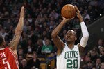 BOSTON, MA - JANUARY 10:  Ray Allen #30 of the Boston Celtics shoots a three point shot as Courtney Lee #5 of the Houston Rockets defends on January 10, 2011 at the TD Garden in Boston, Massachusetts.  NOTE TO USER: User expressly acknowledges and agrees that, by downloading and/or using this Photograph, User is consenting to the terms and conditions of the Getty Images License Agreement.  (Photo by Elsa/Getty Images)