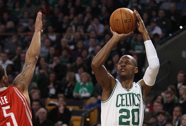 BOSTON, MA - JANUARY 10:  Ray Allen #30 of the Boston Celtics shoots a three point shot as Courtney Lee #5 of the Houston Rockets defends on January 10, 2011 at the TD Garden in Boston, Massachusetts.  NOTE TO USER: User expressly acknowledges and agrees that, by downloading and/or using this Photograph, User is consenting to the terms and conditions of the Getty Images License Agreement.  (Photo by Elsa/Getty Images)