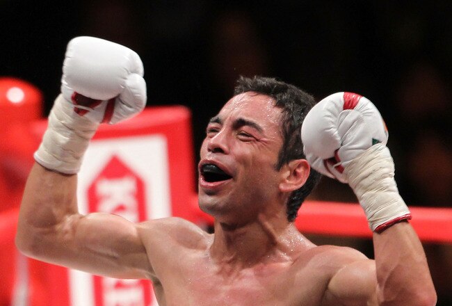 TOKYO - APRIL 30:  Fernando Montiel of Mexico celebrates after knocking out Hozumi Hasegawa of Japan during the WBC Bantamweight Title Fight between Hozumi Hasegawa and Fernando Montiel at Nippon Budokan on April 30, 2010 in Tokyo, Japan.  (Photo by Koichi Kamoshida/Getty Images)
