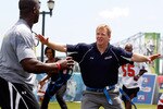 NEW ORLEANS - SEPTEMBER 08:  NFL commissioner Roger Goodell  plays on the field during the NFL�s Play 60 campaign to fight childhood obesity at Brock Elementary School September 8, 2010 in New Orleans, Louisiana. Obama joined NFL Commissioner Roger Goodell and former NFL coach Tony Dungy to promote the Play 60 campaign and the NFL's newest efforts to support Let's Move! (Photo by Chris Graythen/Getty Images)