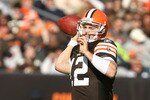 CLEVELAND - NOVEMBER 07:  Quarterback Colt McCoy #12 of the Cleveland Browns throws to a receiver against the New England Patriots at Cleveland Browns Stadium on November 7, 2010 in Cleveland, Ohio.  (Photo by Matt Sullivan/Getty Images)