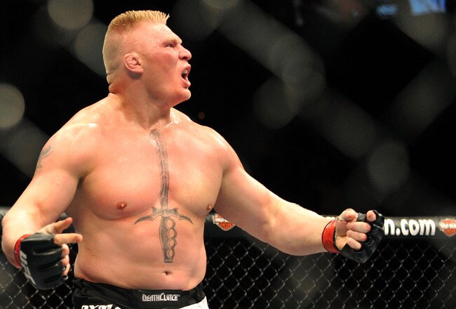 LAS VEGAS - JULY 11:  Brock Lesnar reacts after knocking out Frank Mir during their heavyweight title bout during UFC 100 on July 11, 2009 in Las Vegas, Nevada.  (Photo by Jon Kopaloff/Getty Images)