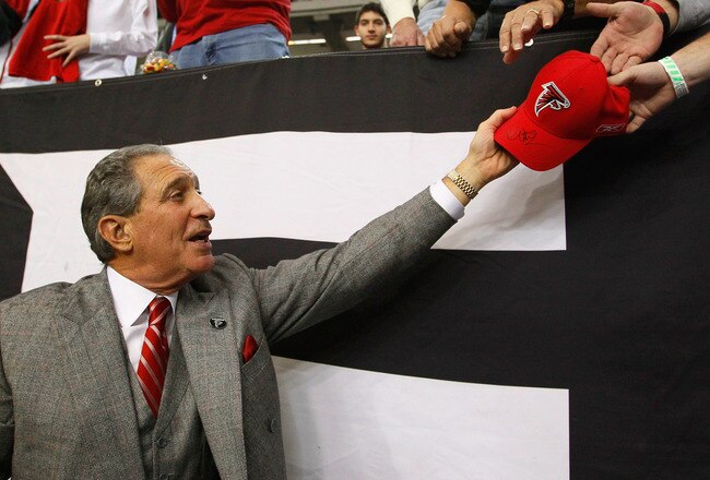ATLANTA, GA - JANUARY 02:  Owner and CEO Arthur Blank of the Atlanta Falcons celebrates with fans after their 31-10 win over the Carolina Panthers at Georgia Dome on January 2, 2011 in Atlanta, Georgia.  (Photo by Kevin C. Cox/Getty Images)