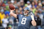 SEATTLE, WA - JANUARY 08:  Quarterback Matt Hasselbeck #8 of the Seattle Seahawks throws a 45-yard touchdown pass to Brandon Stokley #15 in the second quarter against the New Orleans Saints during the 2011 NFC wild-card playoff game at Qwest Field on January 8, 2011 in Seattle, Washington.  (Photo by Jonathan Ferrey/Getty Images)
