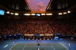 MELBOURNE, AUSTRALIA - JANUARY 31:  The sun sets over Rod Laver Arena in the men's final match between Andy Murray of Great Britain and Roger Federer of Switzerland during day fourteen of the 2010 Australian Open at Melbourne Park on January 31, 2010 in Melbourne, Australia.  (Photo by Scott Barbour/Getty Images)