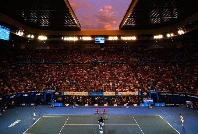MELBOURNE, AUSTRALIA - JANUARY 31:  The sun sets over Rod Laver Arena in the men's final match between Andy Murray of Great Britain and Roger Federer of Switzerland during day fourteen of the 2010 Australian Open at Melbourne Park on January 31, 2010 in Melbourne, Australia.  (Photo by Scott Barbour/Getty Images)