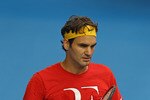MELBOURNE, AUSTRALIA - JANUARY 12:  Roger Federer of Switzerland looks on during a practice session ahead of the 2011 Australian Open at Melbourne Park on January 12, 2011 in Melbourne, Australia.  (Photo by Scott Barbour/Getty Images)